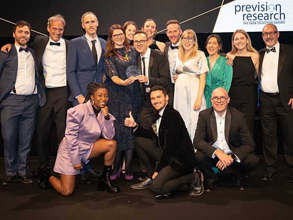 The MTM team collect their award for research live agency of the year at the MRS Awards 2023, pictured with awards host Sophie Duker.